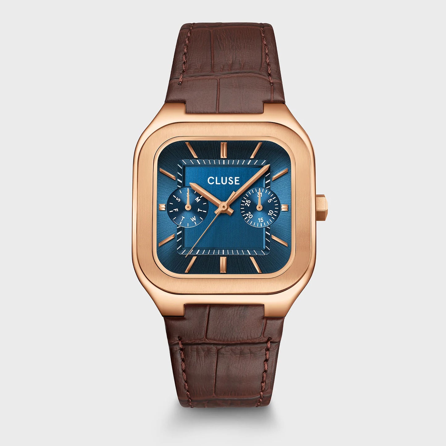 CLUSE Quadrus multifunction leather watch with rose gold and blue accents, featuring a sleek round face and elegant leather strap.