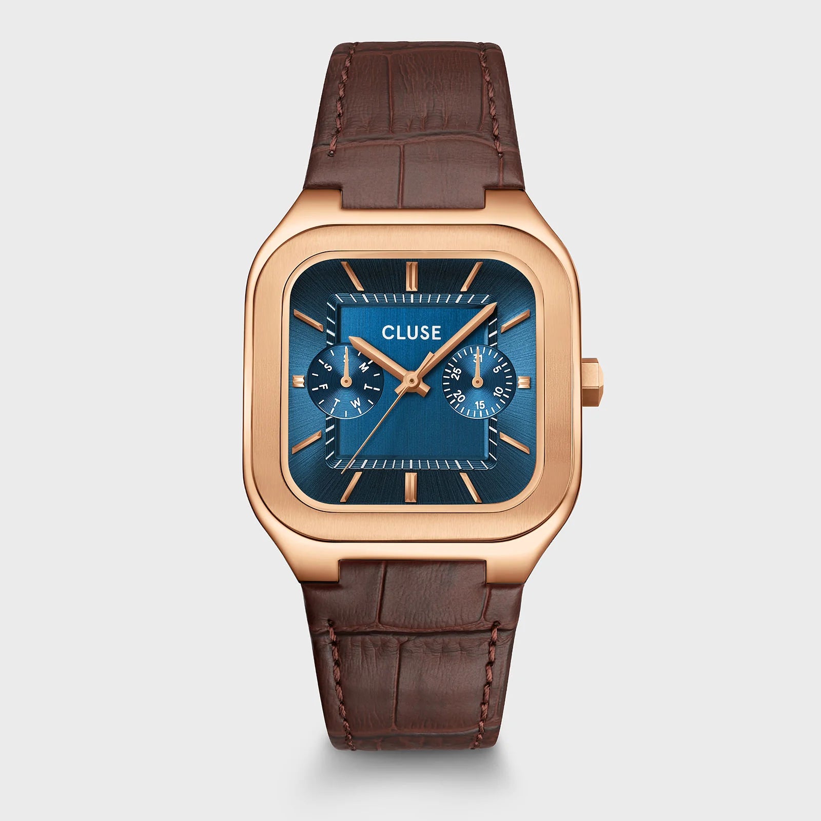 CLUSE Quadrus multifunction leather watch with rose gold and blue accents, featuring a sleek round face and elegant leather strap.