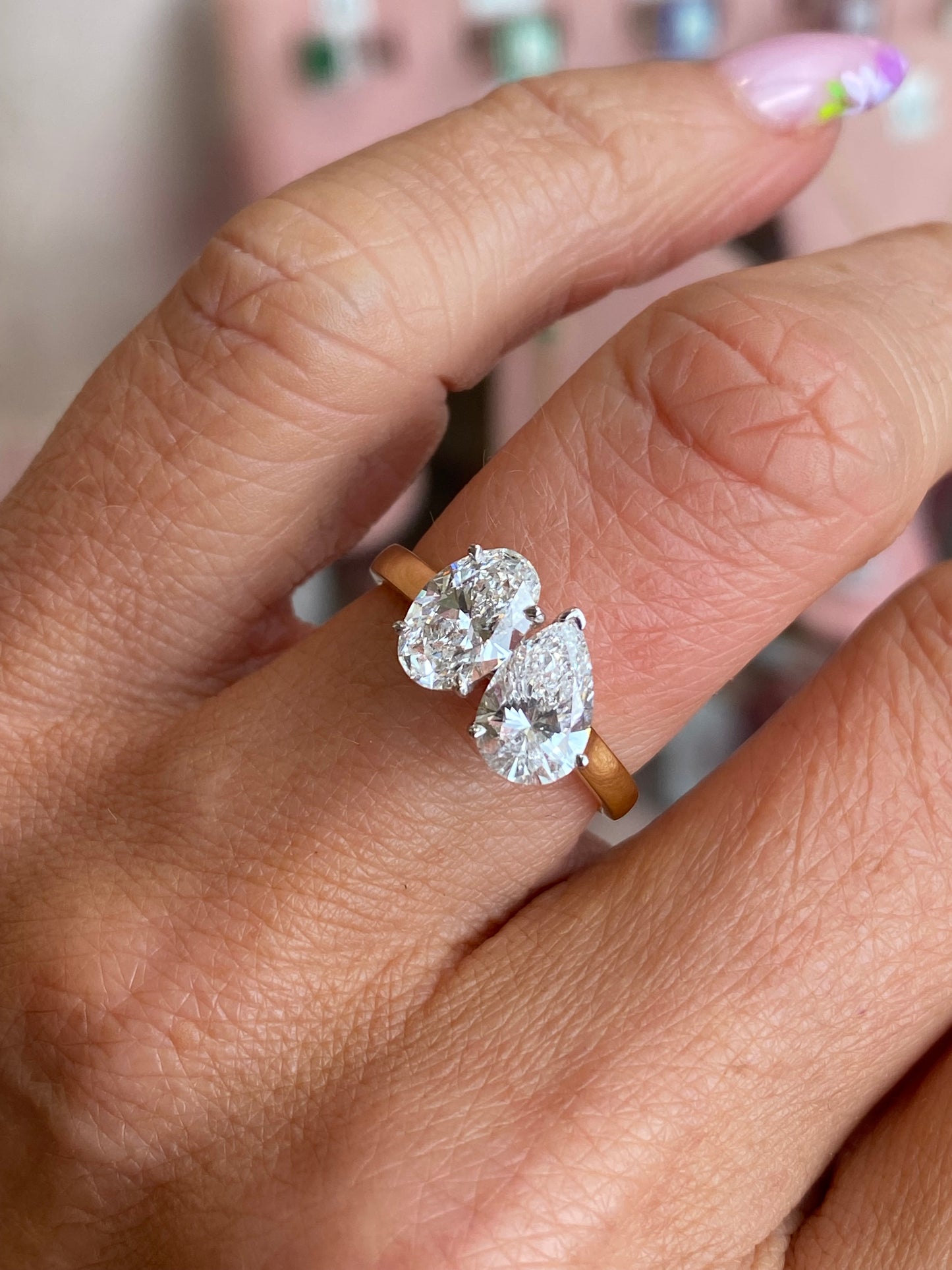 18ct gold Moi et Toi engagement ring by TCA featuring two intertwined bands with a polished finish.