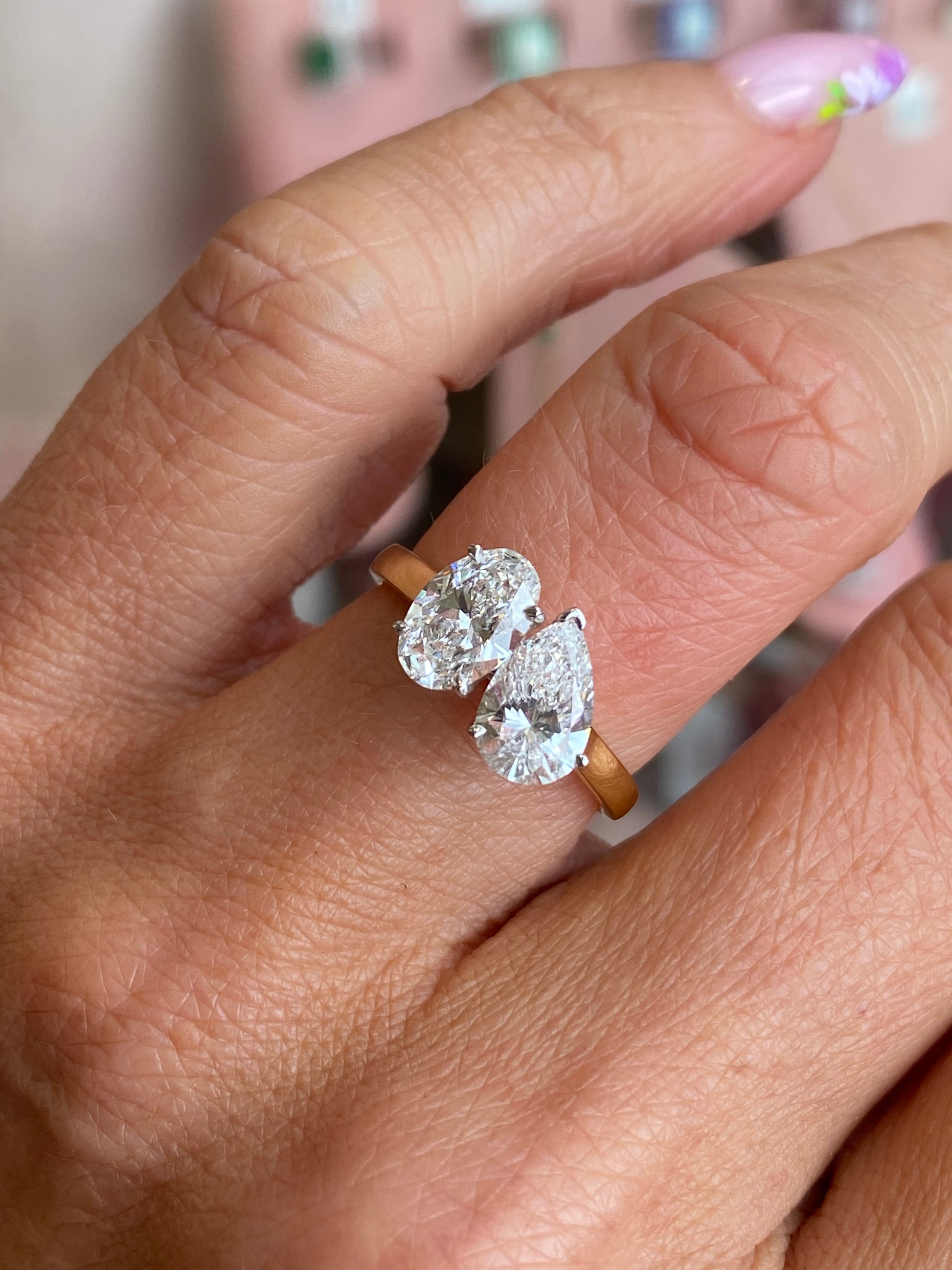 18ct gold Moi et Toi engagement ring by TCA featuring two intertwined bands with a polished finish.