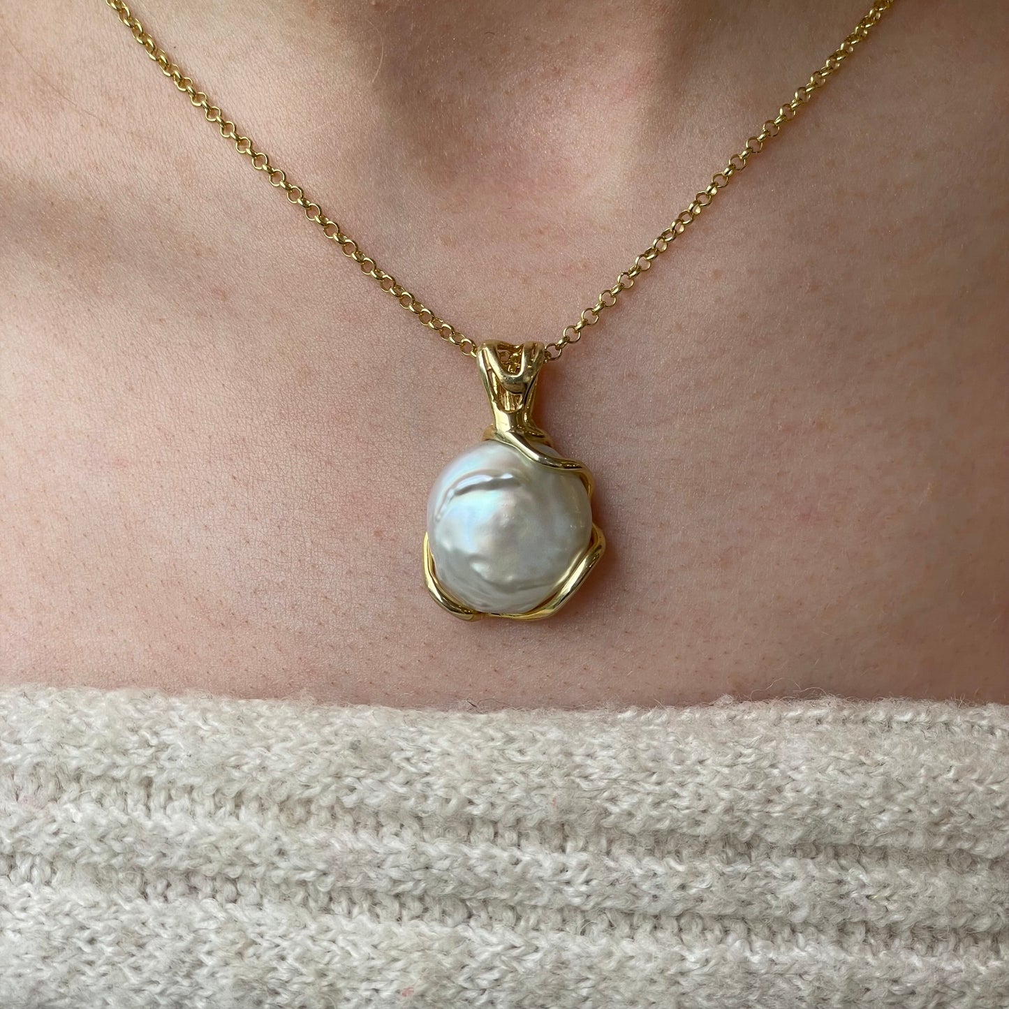 Bruno Sunshine Baroque Pearl Pendant Necklace featuring a large, irregularly shaped pearl on a delicate chain.