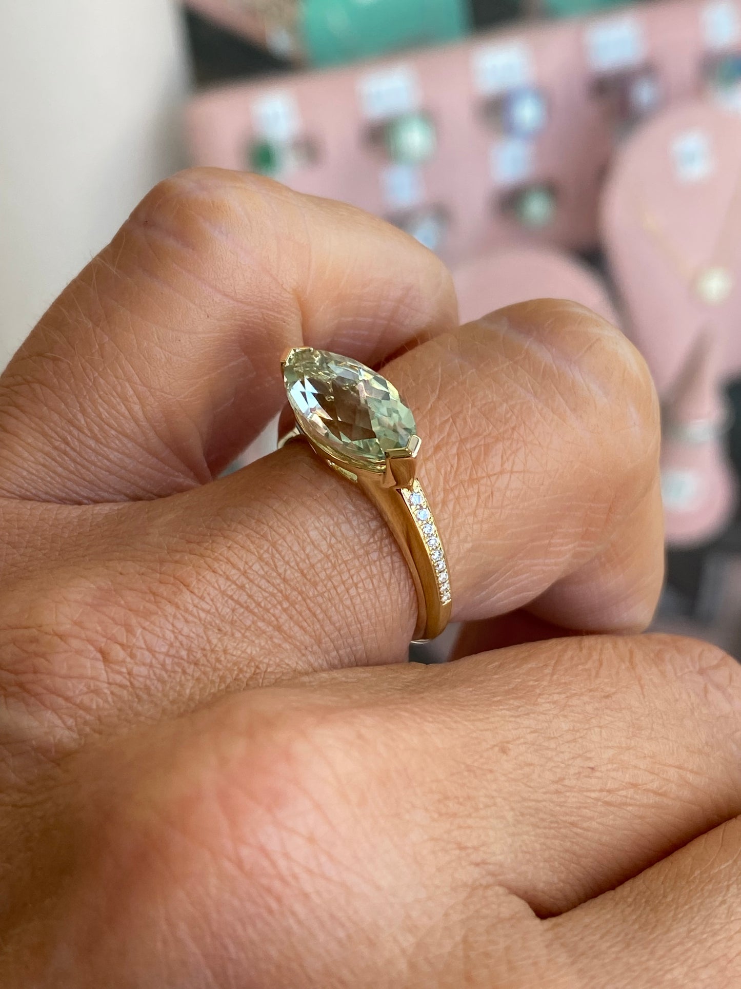 9ct gold green amethyst and diamond ring with intricate design, showcasing a vibrant green gemstone and sparkling diamonds.