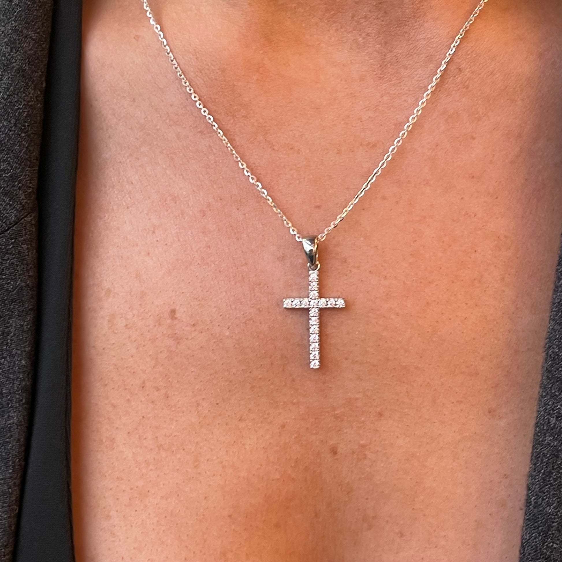 Silver CZ cross necklace on a chain, 18 inch length, by Comero, featuring a sparkling cross pendant and polished silver finish.