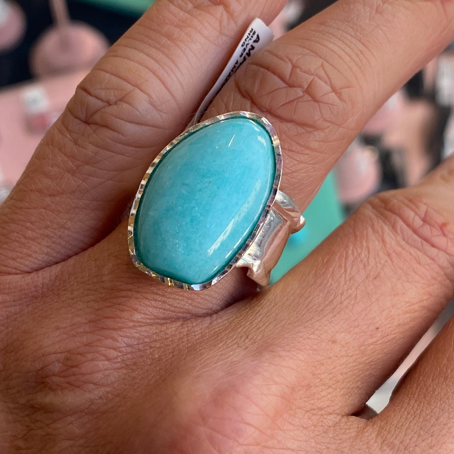 Silver Amazonite nugget ring by Bruno featuring a polished, irregular-shaped blue-green gemstone set in a sleek silver band.