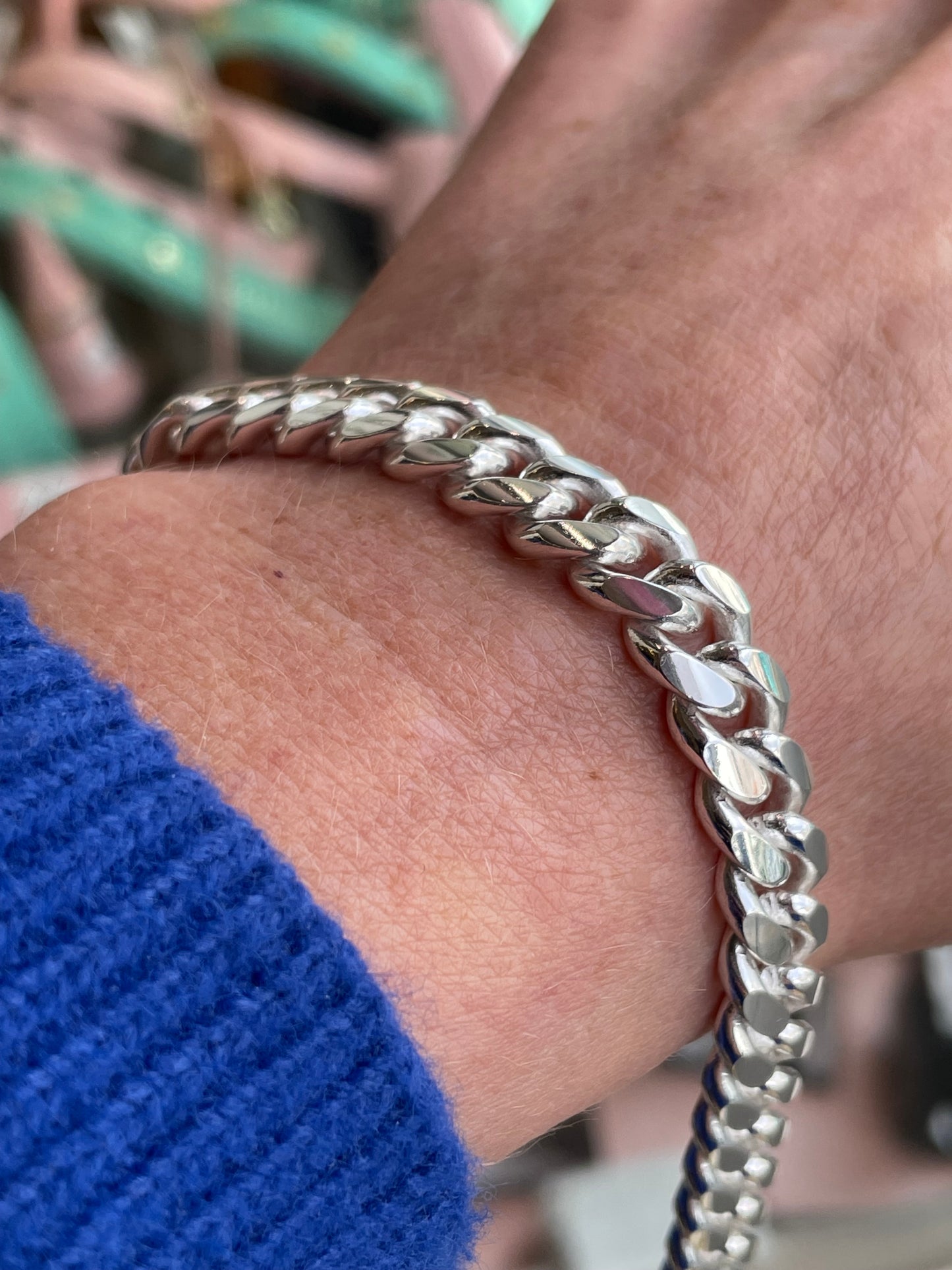 Silver chunky solid curb bracelet by Insignia, 20cm length, featuring bold interlocking links on a white background.