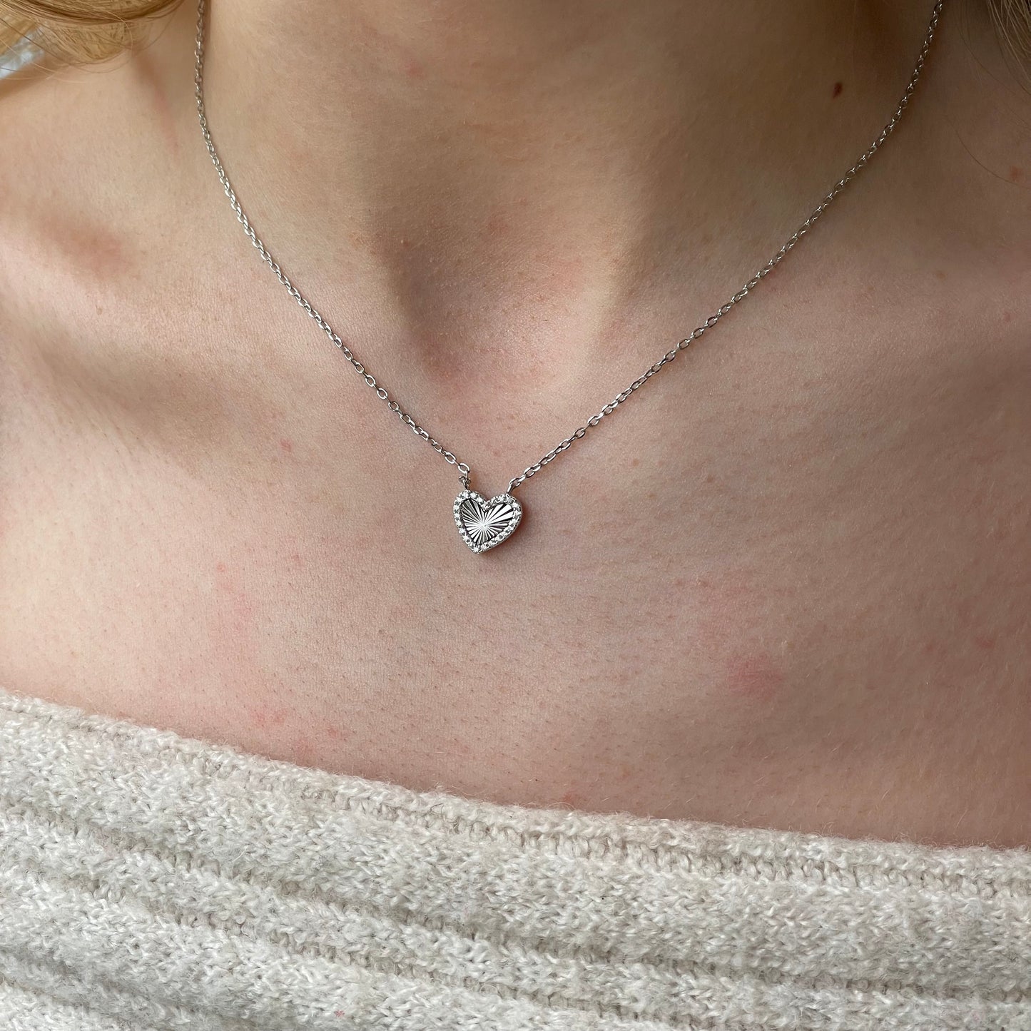 Silver CZ heart necklace by Comero with 40+5cm chain, featuring a sparkling heart pendant on a sleek silver chain.