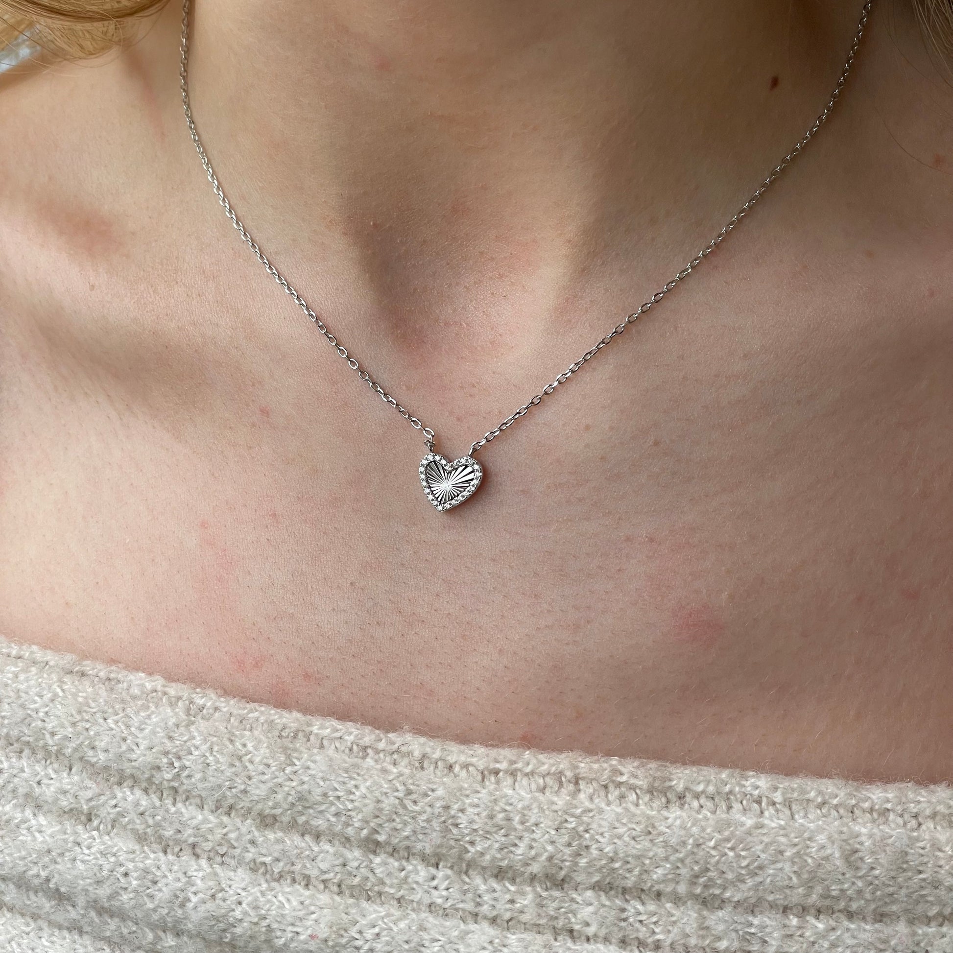 Silver CZ heart necklace by Comero with 40+5cm chain, featuring a sparkling heart pendant on a sleek silver chain.