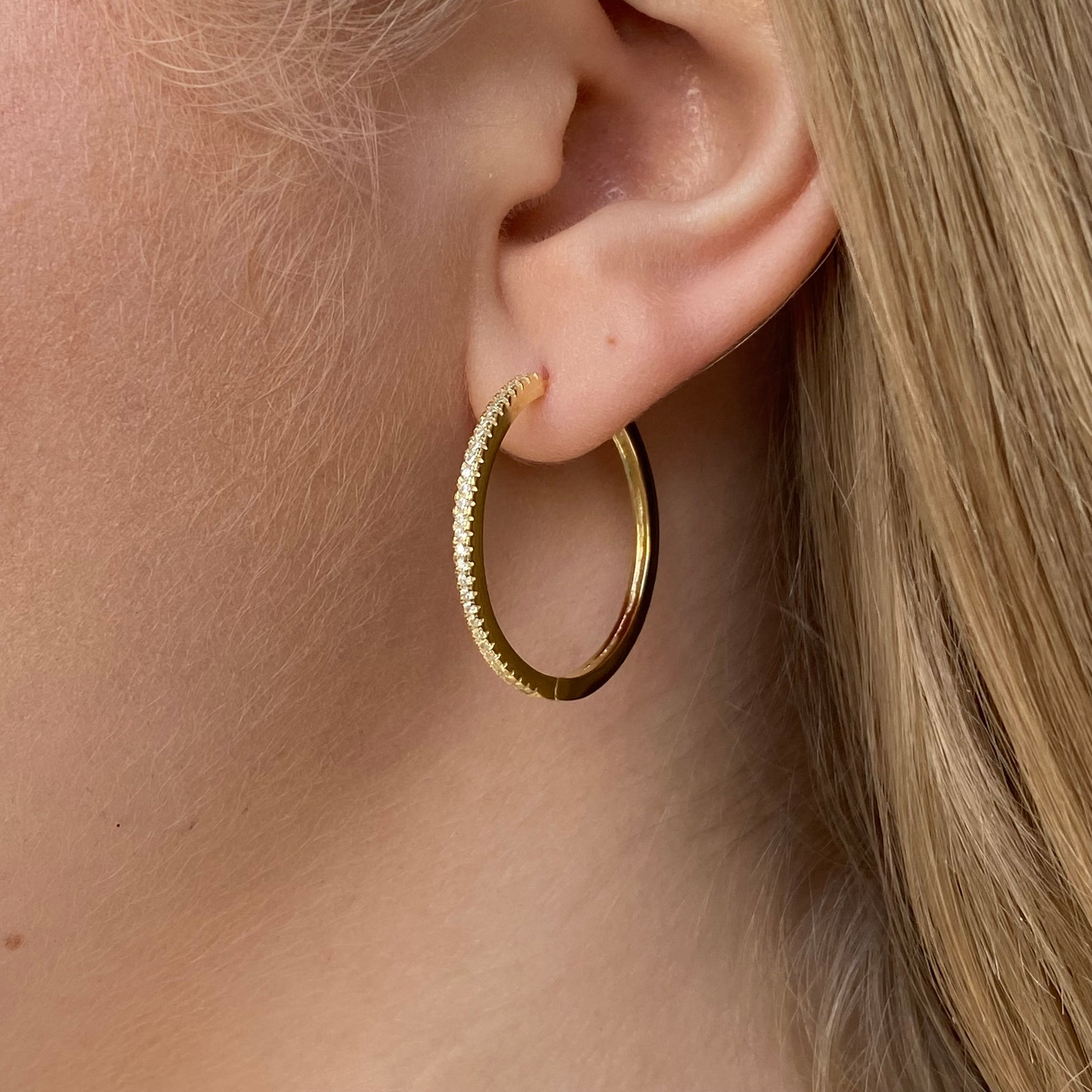 Sunshine Skinny CZ Hoop Earrings by Comero, 30mm, gold-tone jewelry with sparkling cubic zirconia accents.