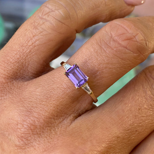 Insignia 9ct gold east-west ring with amethyst and cubic zirconia gemstones, featuring a sleek and elegant design.