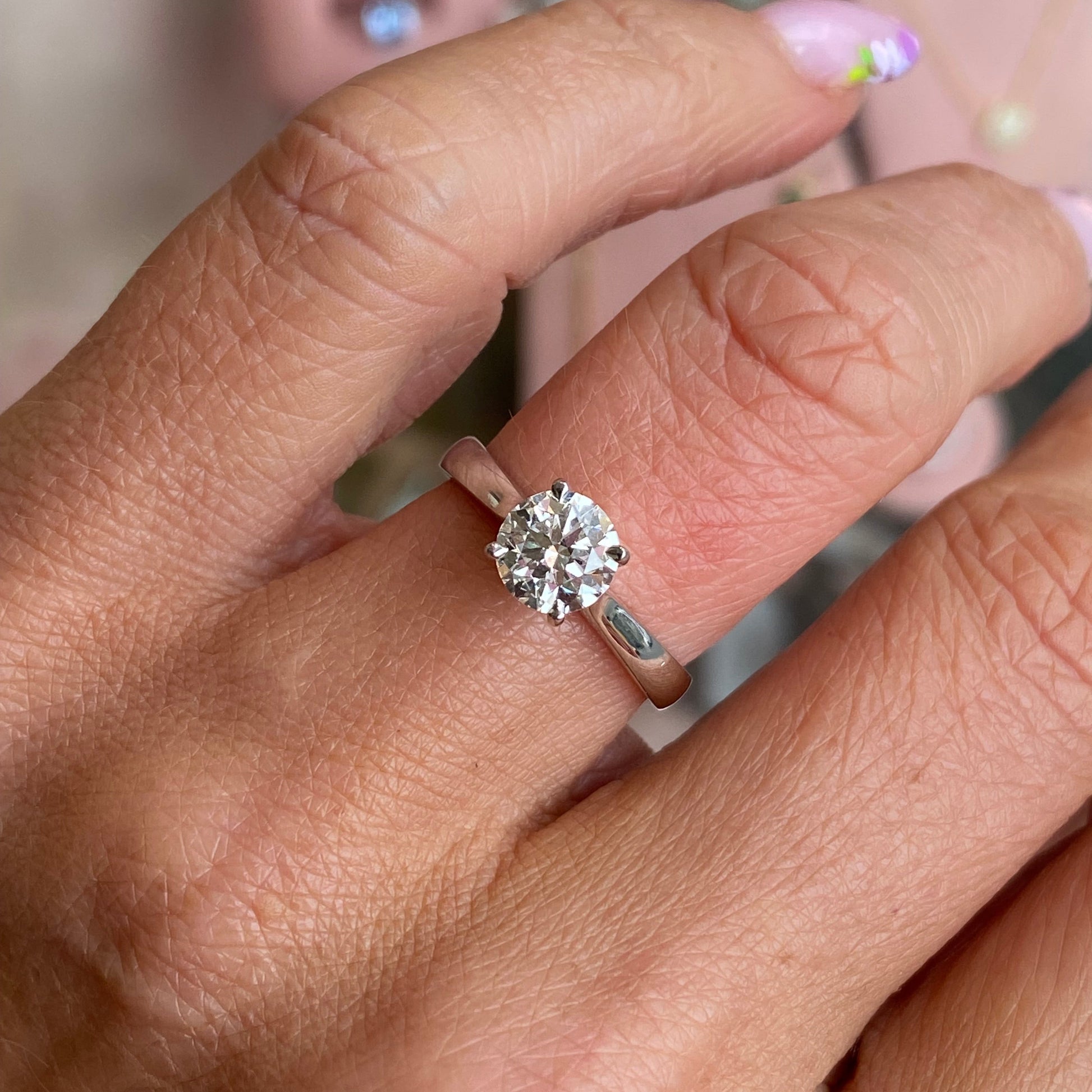 Platinum solitaire engagement ring by TCA with a 1.12ct certificated lab-grown diamond, showcasing a single sparkling center stone.