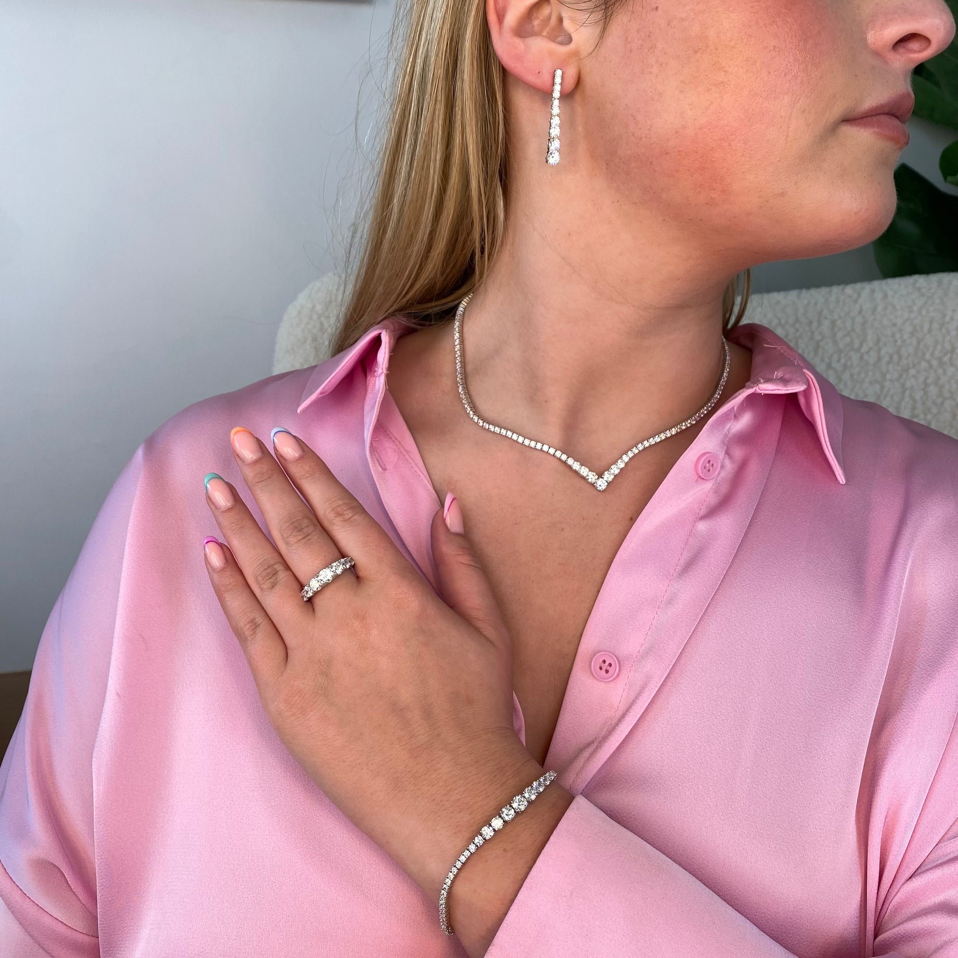 Silver Julianna drop earrings by Comero featuring elegant, dangling design with a polished silver finish.