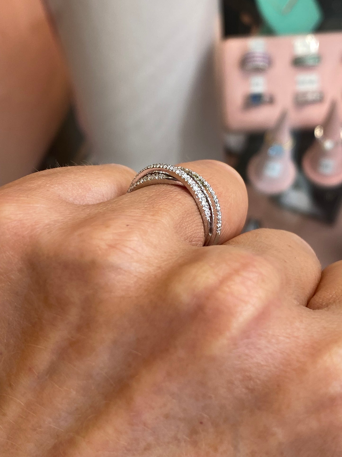 Mirco 18ct white gold braided diamond eternity ring with 0.43ct of sparkling diamonds, showcasing intricate design and craftsmanship.