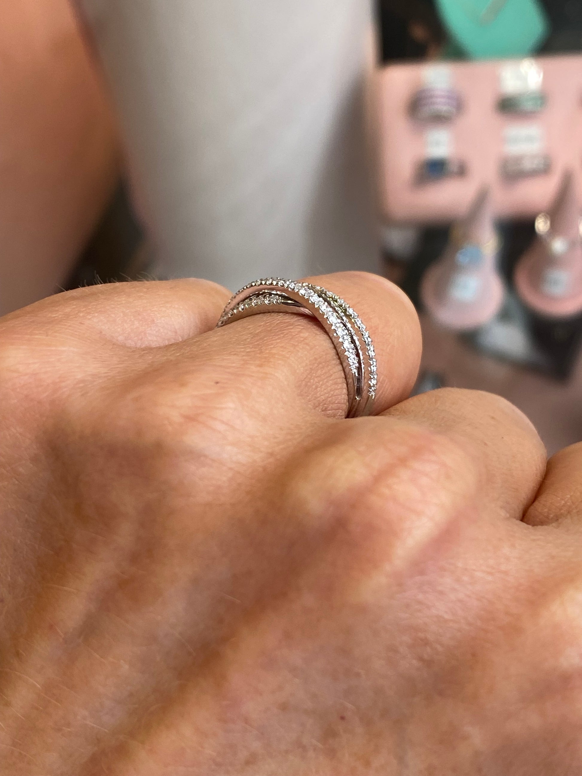 Mirco 18ct white gold braided diamond eternity ring with 0.43ct of sparkling diamonds, showcasing intricate design and craftsmanship.