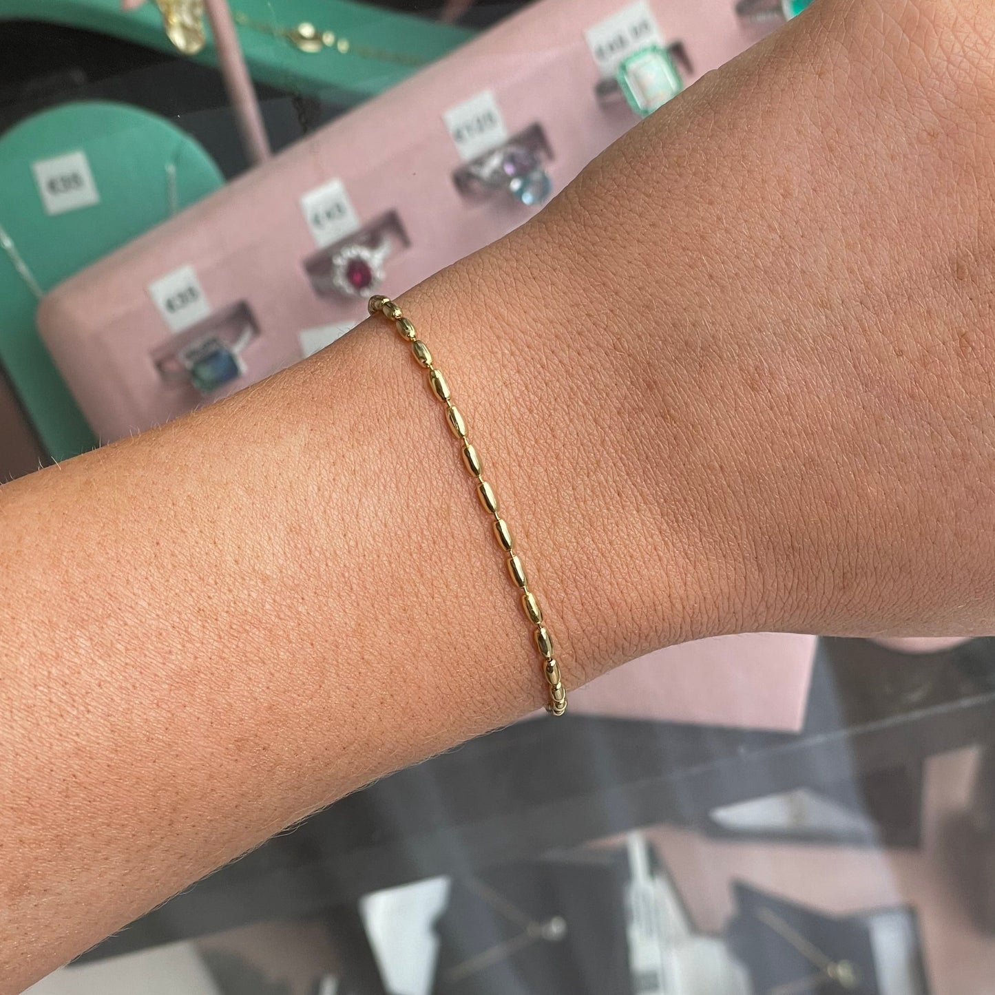 Sunshine Seed Bracelet by CME featuring yellow seed beads and adjustable cord for a stylish, natural jewelry accessory.