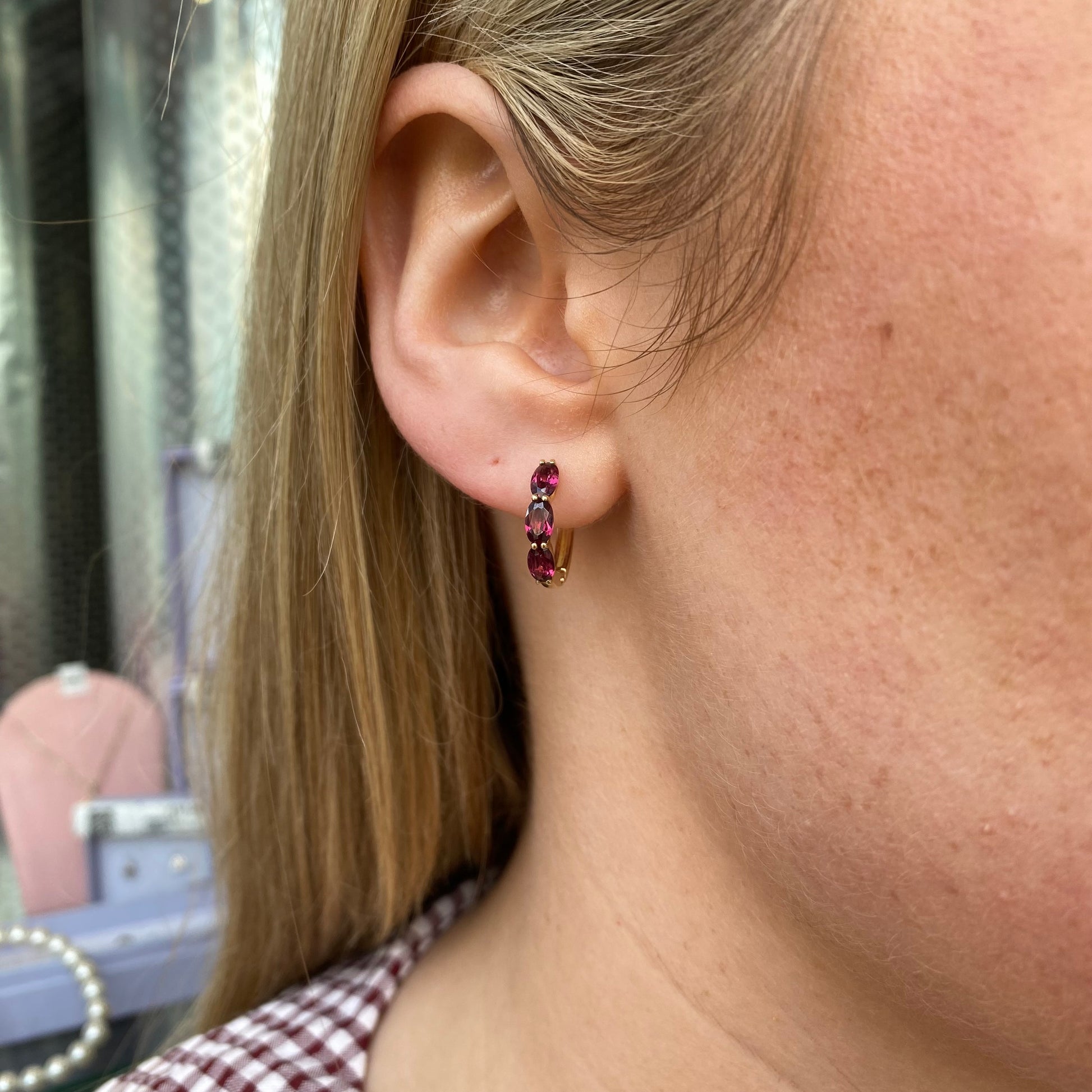 9ct gold garnet huggie hoop earrings by Mark Milton, 15mm size, featuring vibrant garnet stones and a sleek gold finish.