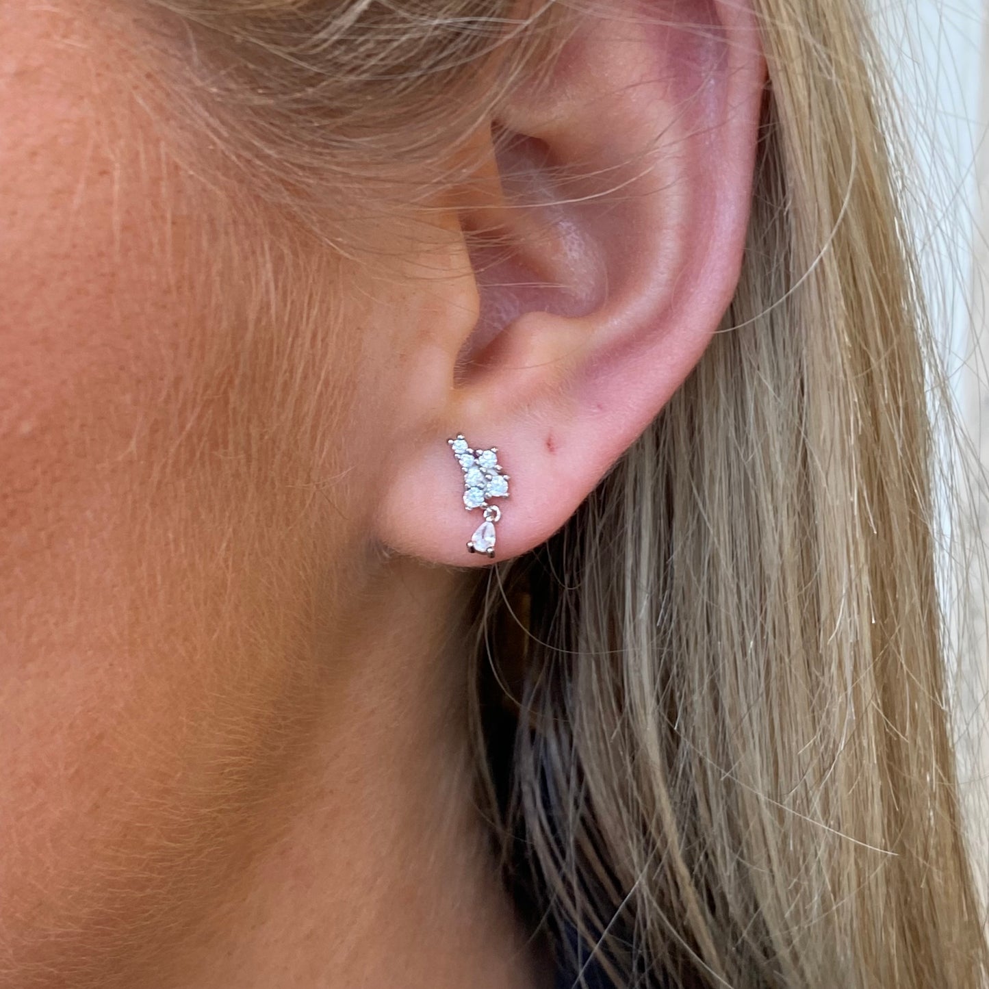 Silver Pretty CZ Drop Earrings by Comero featuring sparkling cubic zirconia stones and elegant dangle design.