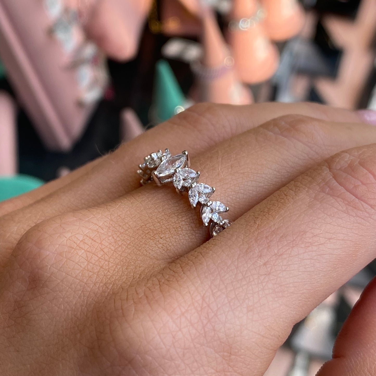 Silver Katelyn Ring by Comero featuring a sleek, polished design with elegant detailing on a plain background.