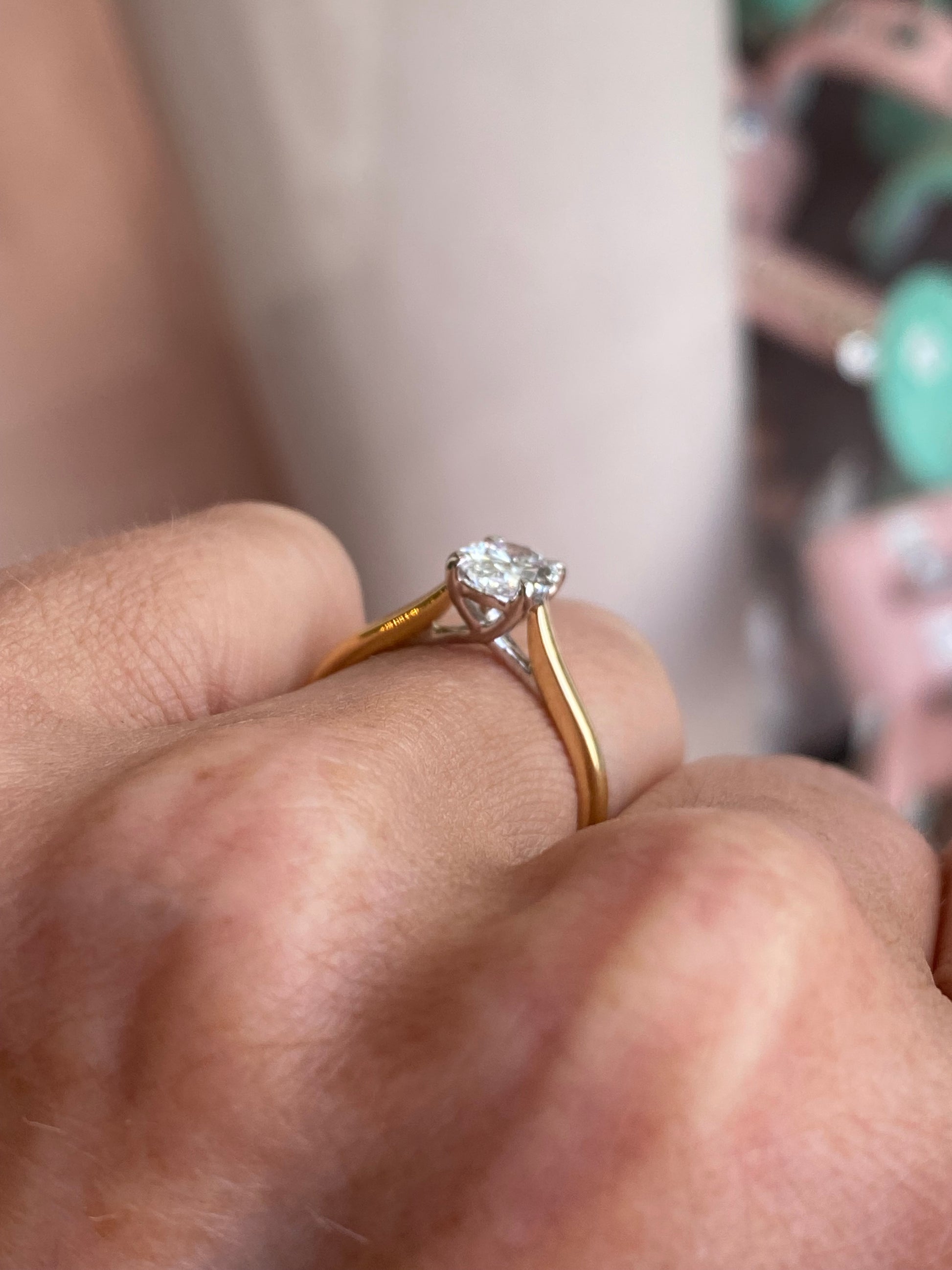 Prima 18ct gold oval solitaire engagement ring with 1.00ct certified lab-grown diamond, showcasing a classic and elegant design.