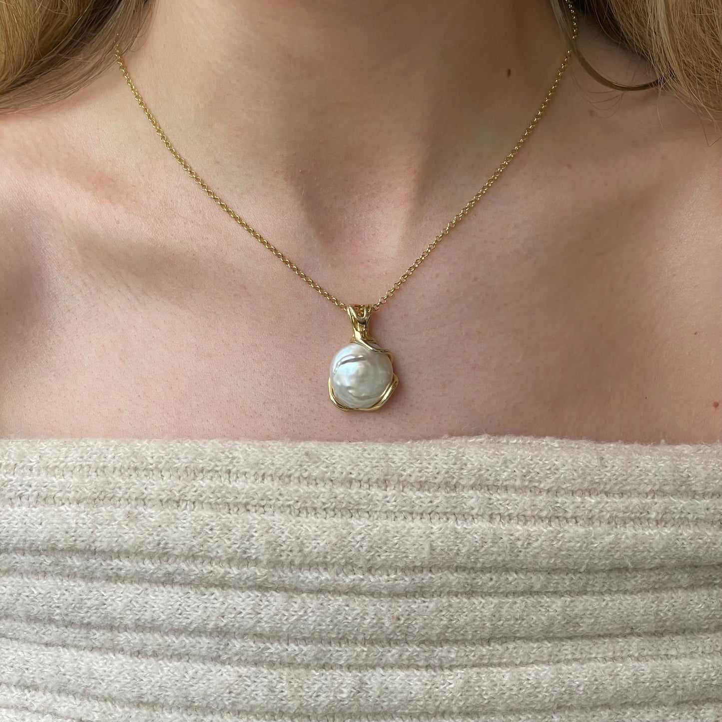 Bruno Sunshine Baroque Pearl Pendant Necklace featuring a large, irregularly shaped pearl on a delicate chain.
