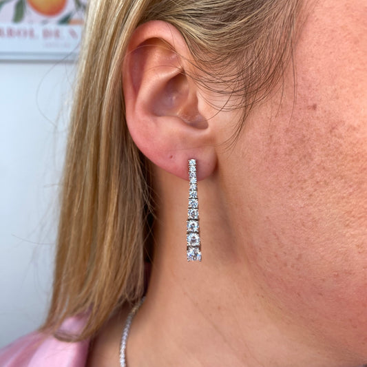 Silver Samantha Drop Earrings by Comero featuring elegant, dangling design with polished silver finish.