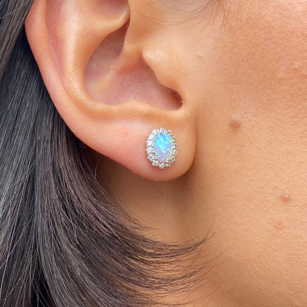 Silver CZ Halo Opalique stud earrings by Insignia featuring sparkling cubic zirconia and vibrant opal-like centers.
