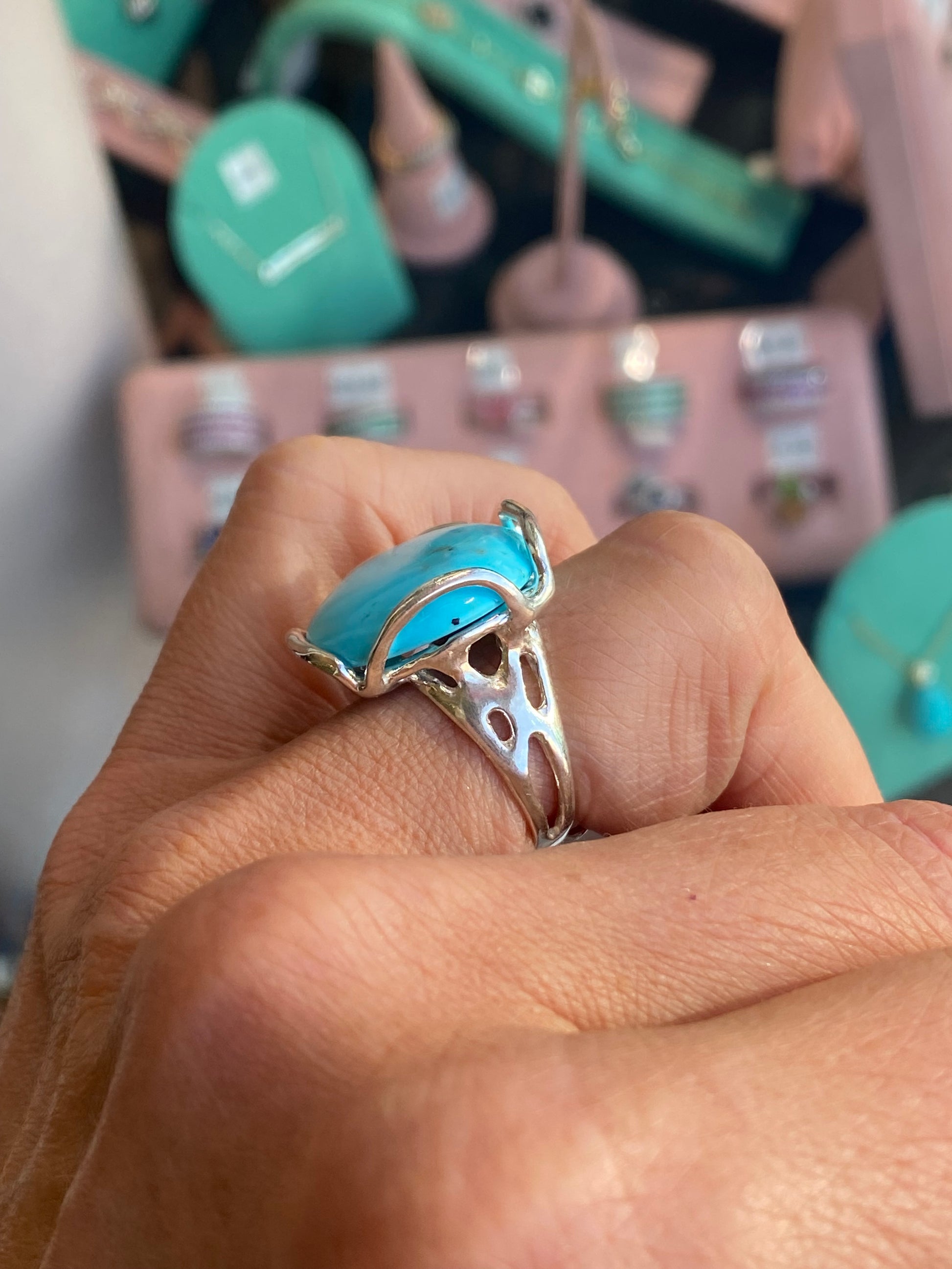 Silver turquoise nugget ring by Bruno featuring a polished silver band with a turquoise gemstone accent.