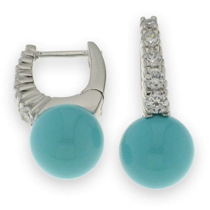Silver CZ and 12mm faux turquoise hoop earrings by Comero, featuring sparkling stones and vibrant turquoise accents.