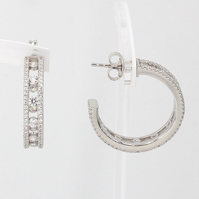 Silver two-row CZ hoop earrings by Comero featuring sparkling cubic zirconia stones and classic hoop design.