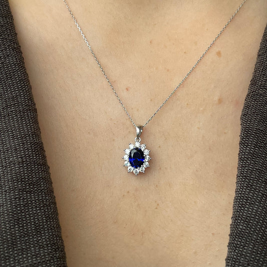 9ct white gold pendant necklace featuring a created sapphire and cubic zirconia stones, elegant jewelry by PJD.