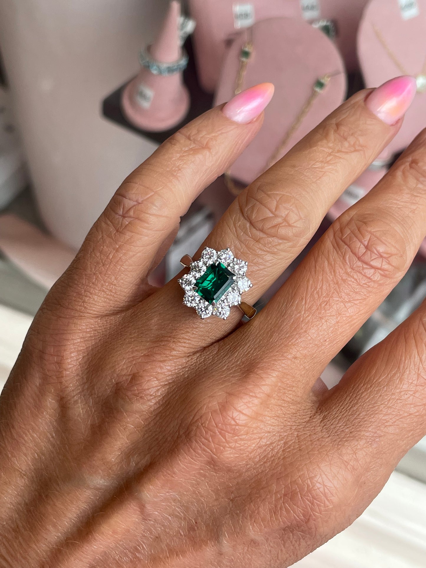 9ct gold lab-grown emerald cluster ring featuring a sparkling emerald gemstone arrangement from TCA.