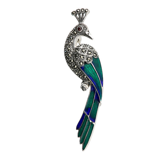 Silver marcasite peacock brooch by CME featuring intricate feather details and sparkling gemstone accents.