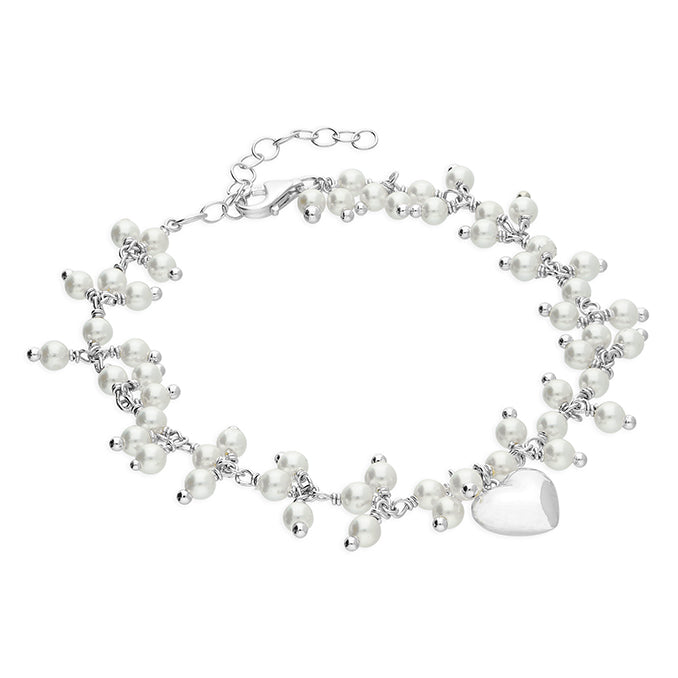 Silver faux pearl and heart bracelet by CME featuring elegant design with silver beads and heart accents.