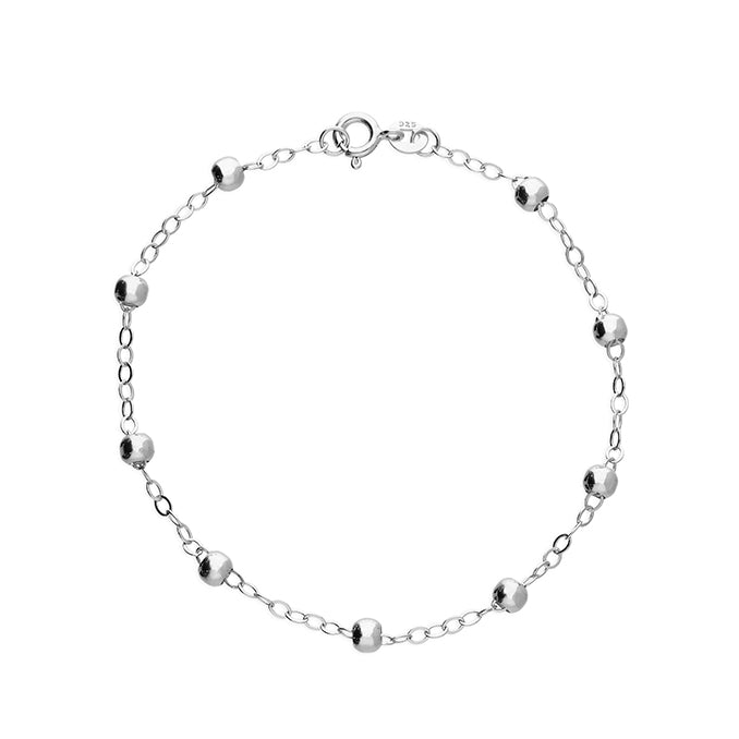 Silver station bracelet by CME featuring evenly spaced round silver beads on a delicate chain.