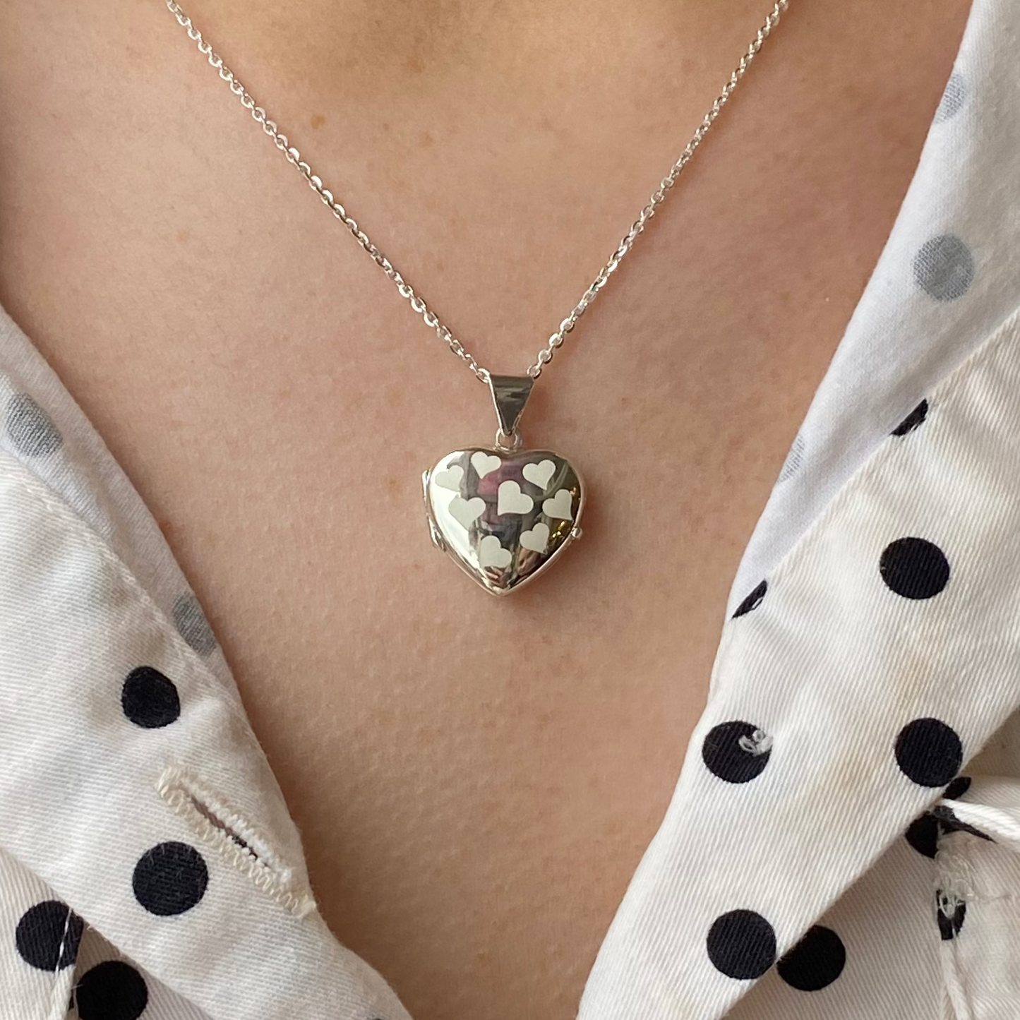 Silver Frosted Hearts locket necklace by THC featuring a heart-shaped pendant with frosted silver finish.