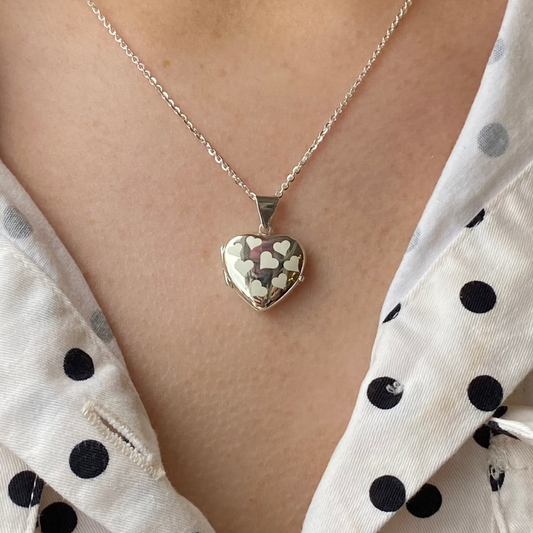 Silver Frosted Hearts locket necklace by THC featuring a heart-shaped pendant with frosted silver finish.