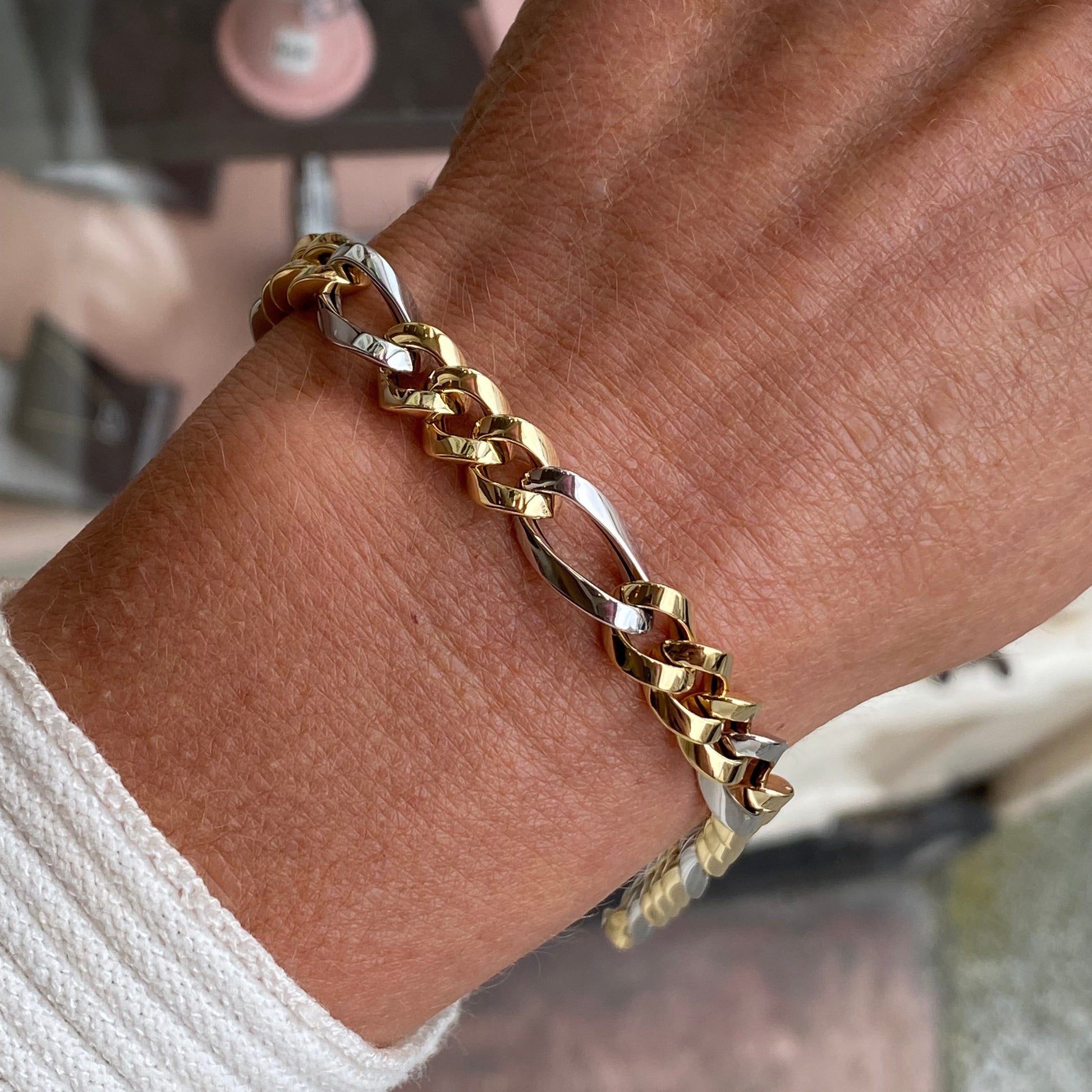Gold two-tone chunky Figaro bracelet by Mark Milton featuring interconnected links in 9-carat gold.