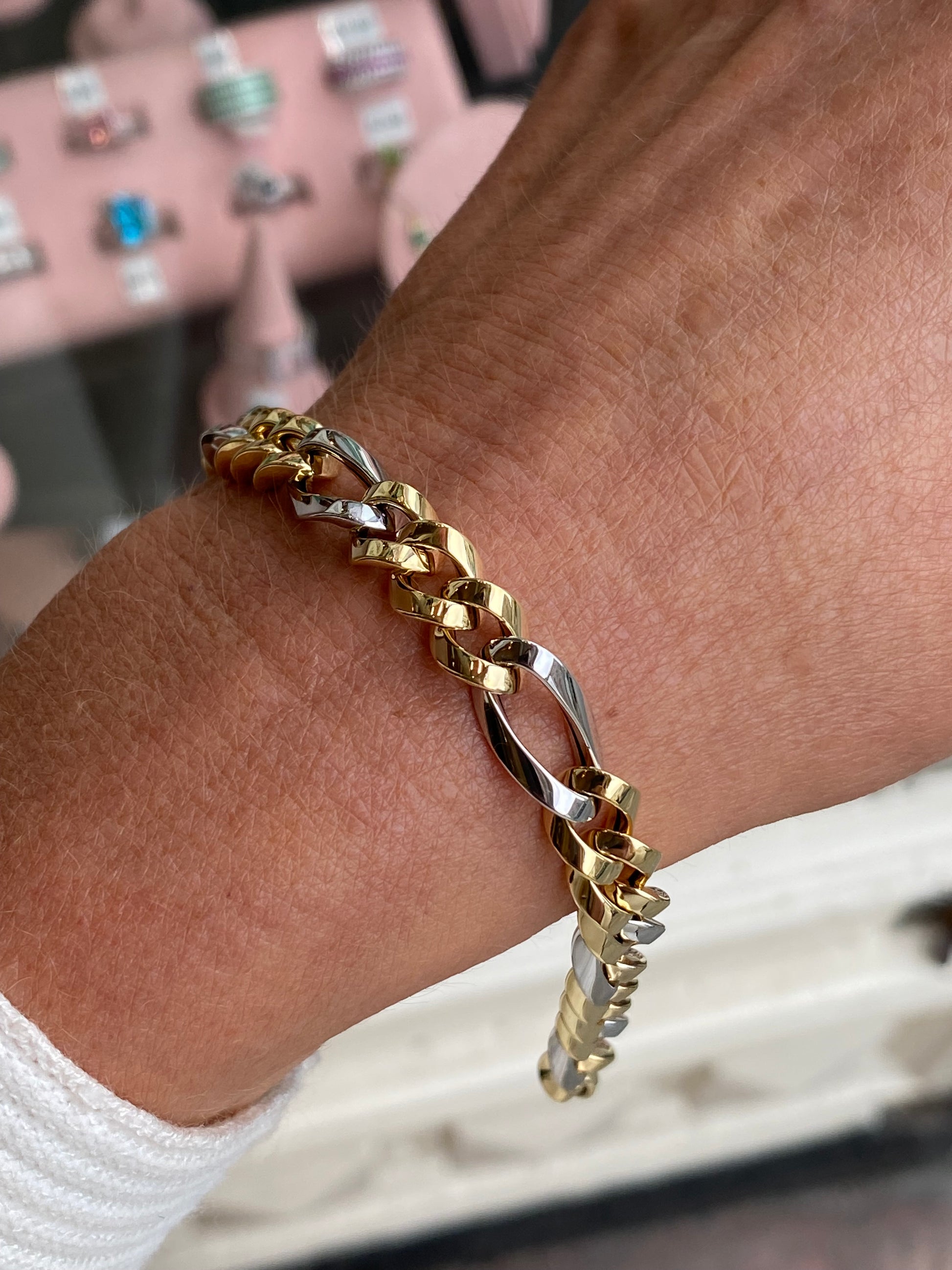 9ct gold two-tone chunky Figaro bracelet by Mark Milton featuring interlinked oval links on a white background