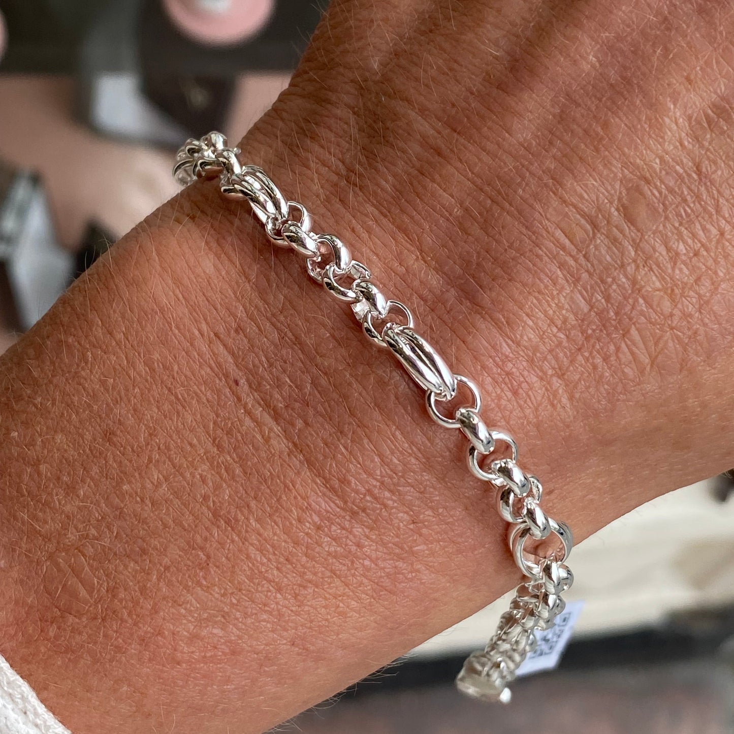 Herbert silver belcher and double link bracelet, 7.5 inches, featuring shiny metal links and intricate bracelet design.