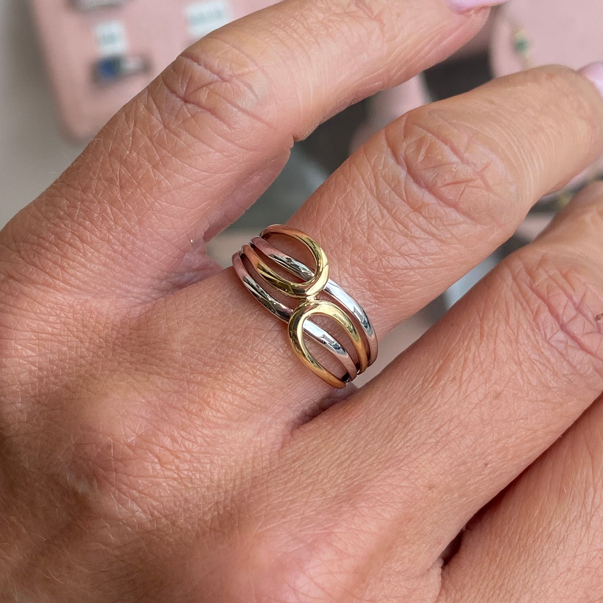 9ct gold two-tone crossover ring by Mark Milton featuring elegant gold and silver design with a sleek, modern style.