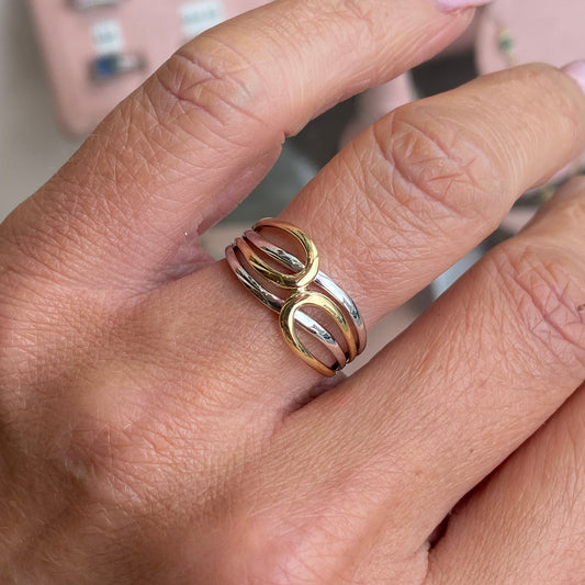 9ct gold two-tone crossover ring by Mark Milton featuring elegant gold and silver design with a sleek, modern style.