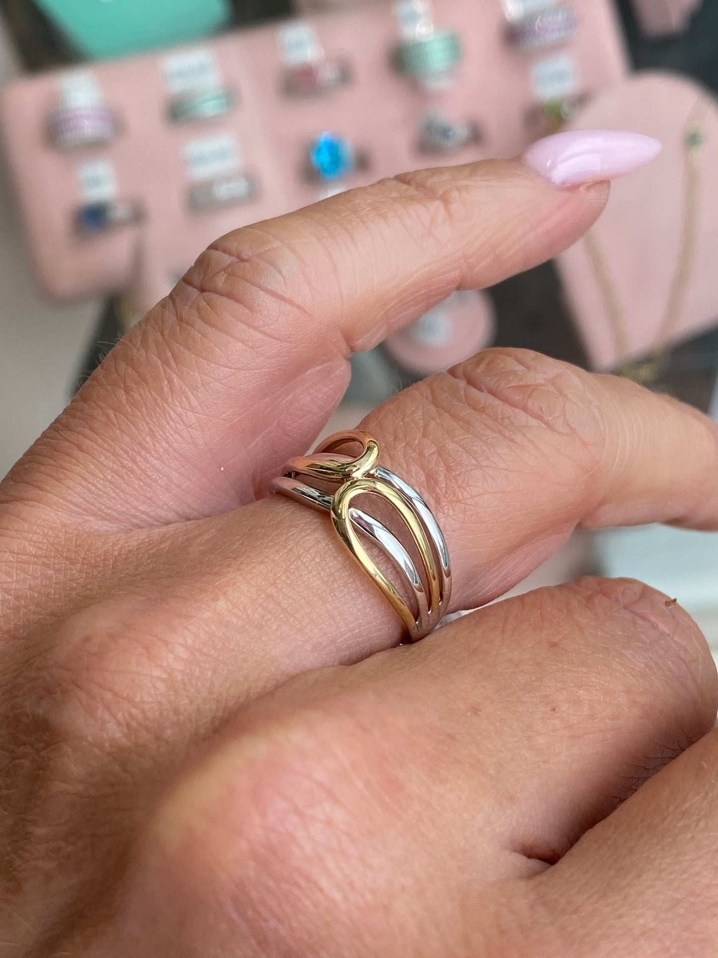 9ct gold two-tone crossover ring by Mark Milton featuring a stylish intertwined design and polished finish.