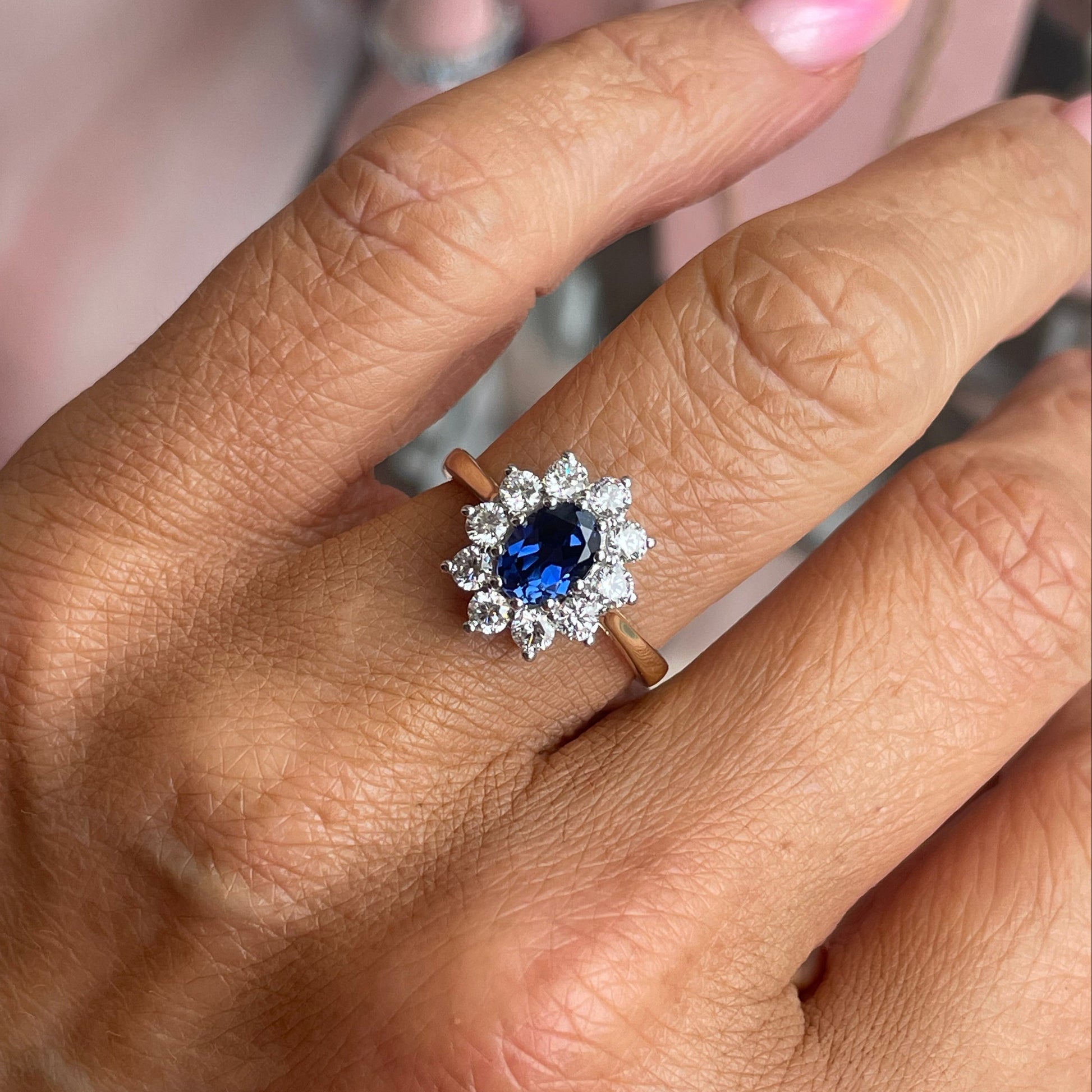 9ct gold lab-grown oval sapphire cluster ring with 5x7mm stones, crafted by PJD, showcasing a elegant jewelry design.