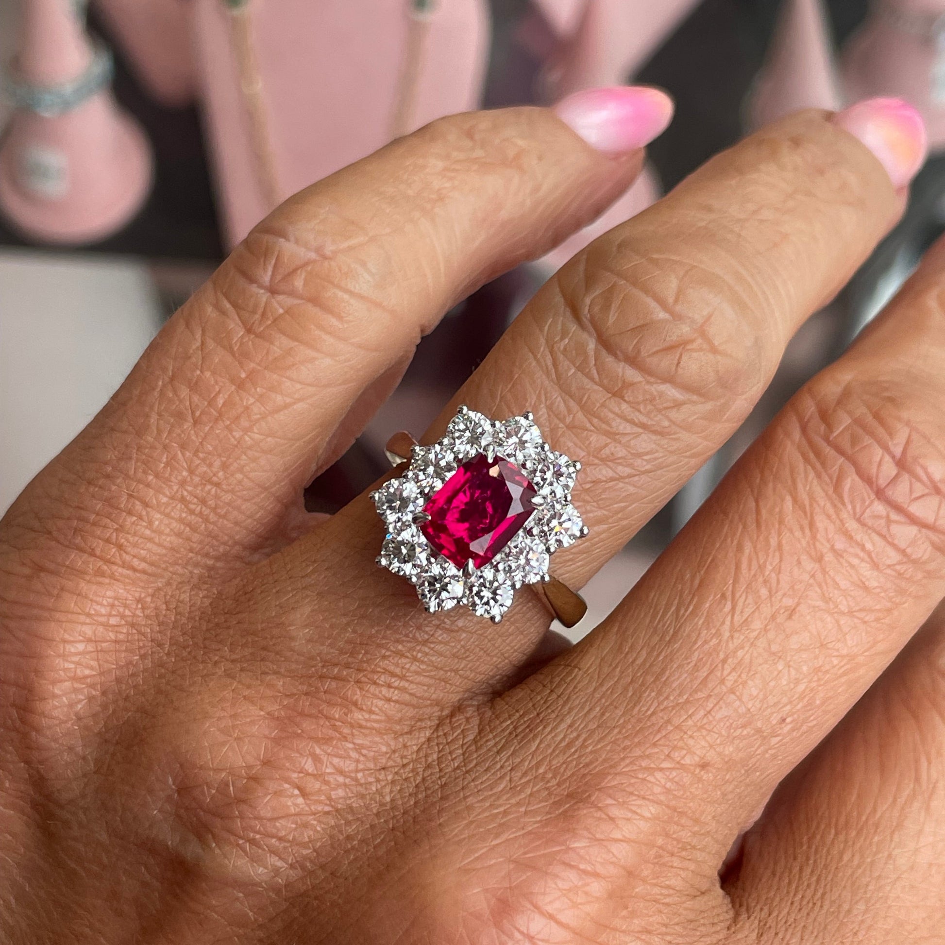 9ct gold lab-grown ruby cluster ring showcasing a vibrant ruby gemstone set in a gold band.