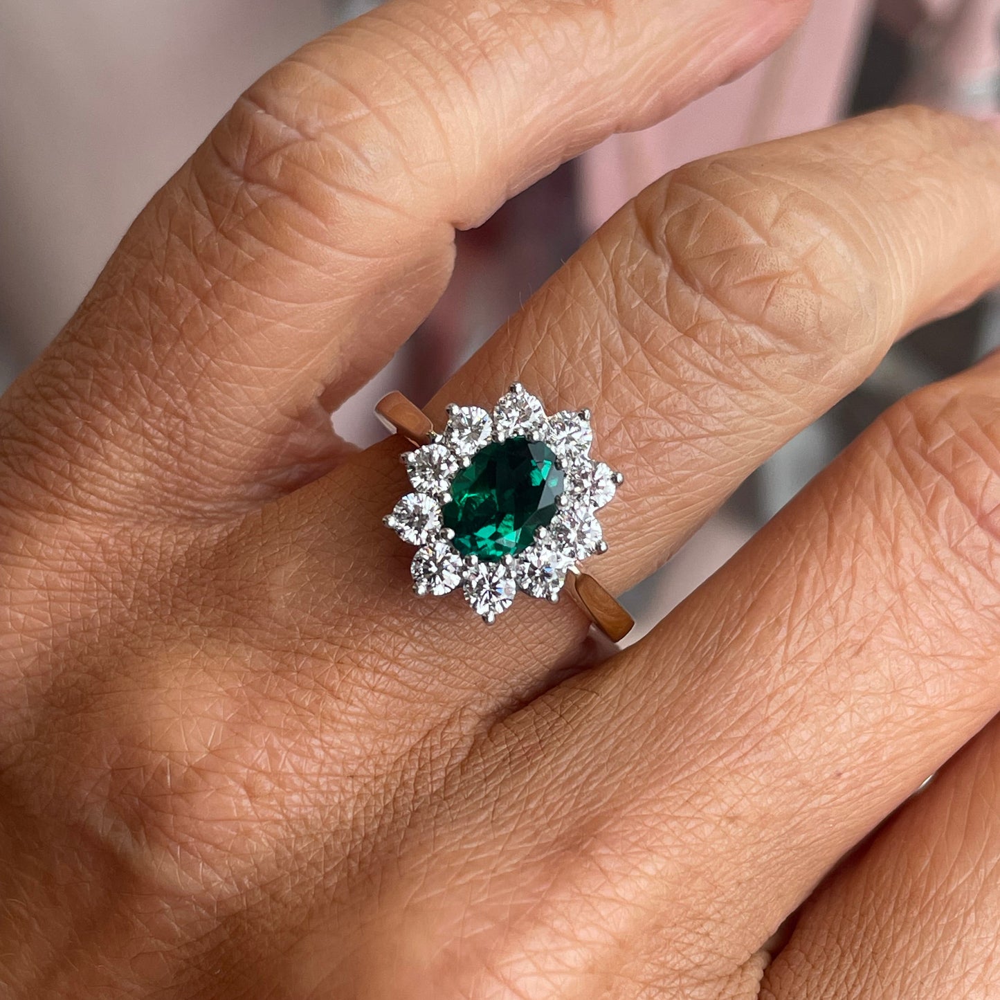 9ct gold lab-grown oval cluster ring with emeralds, featuring a 6x8mm gemstone, by PJD.