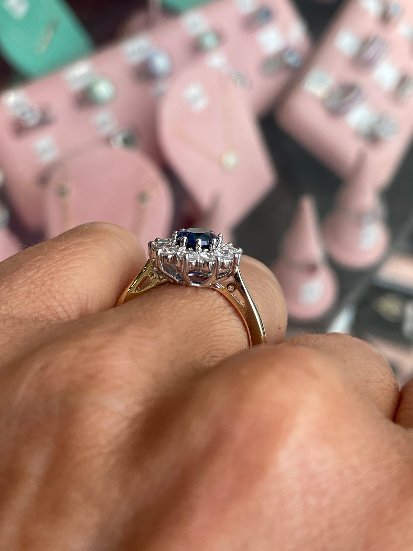 9ct gold lab-grown oval sapphire cluster ring with 6x8mm stones, featuring PJD jewelry design and intricate detailing.