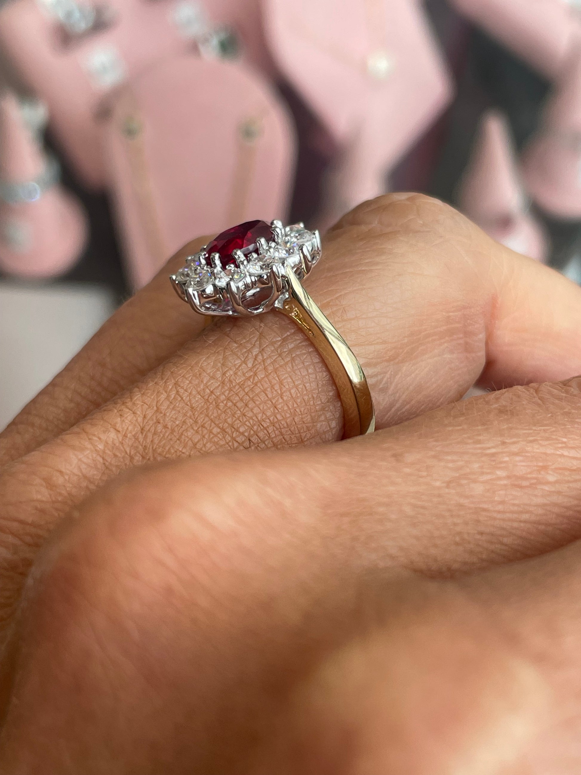 9ct gold lab-grown oval cluster ring with ruby gemstones, PJD brand jewelry, featuring a detailed close-up of the ring's design and stones.