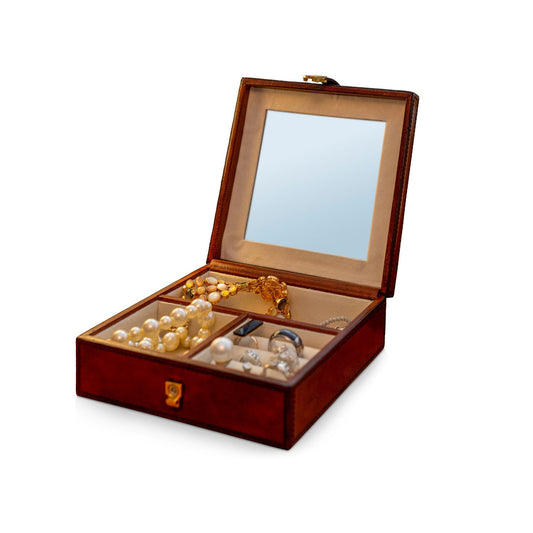 Leather Harrison jewellery box in small to medium size, with compartments for storing rings, necklaces, and earrings.