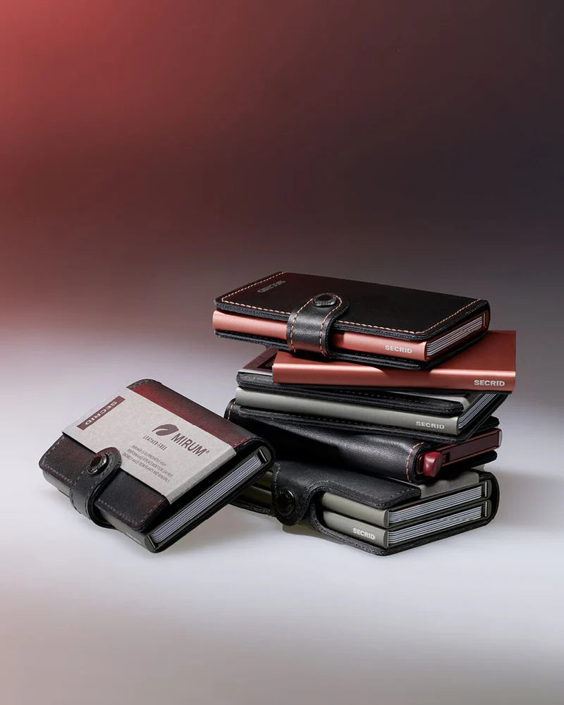 Secrid Miniwallet Mirum Black Rose with card protector, compact leather wallet featuring a black rose design and multiple card slots.