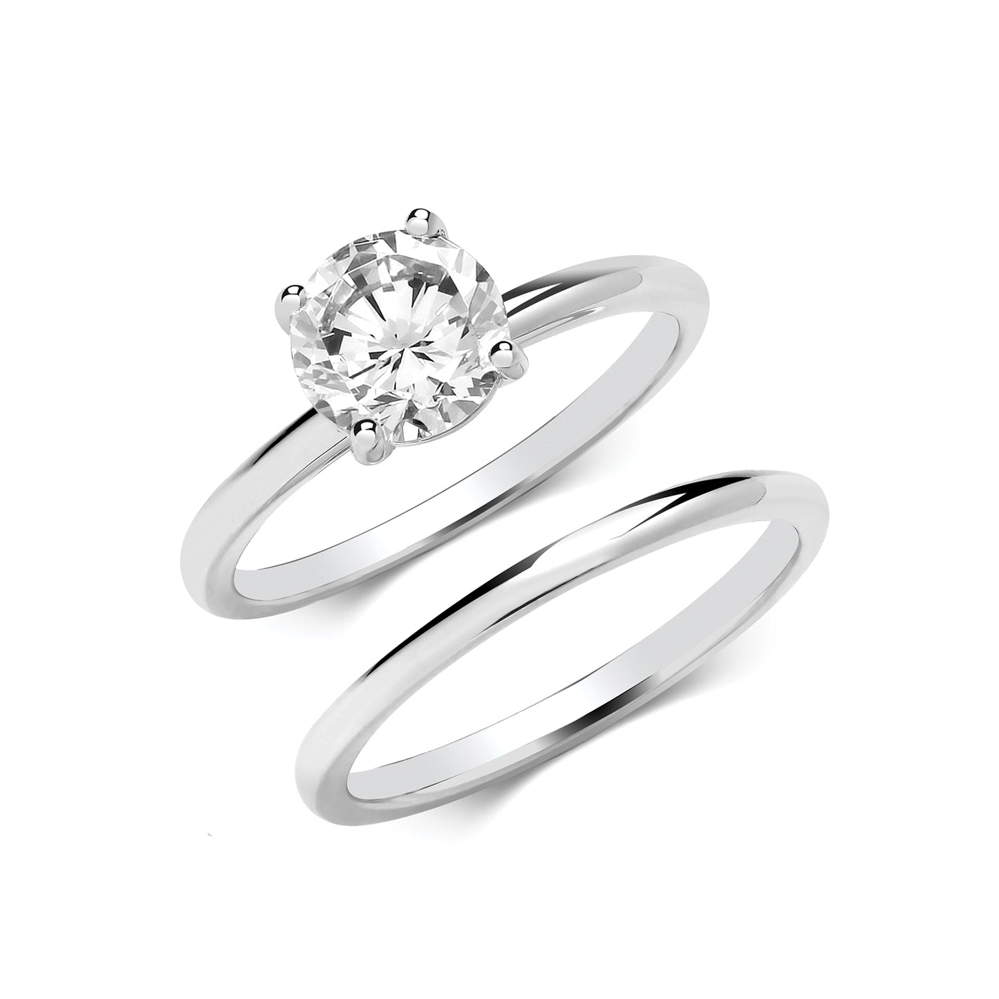 Silver CZ bridal ring set by THC featuring sparkling cubic zirconia stones on matching wedding bands.