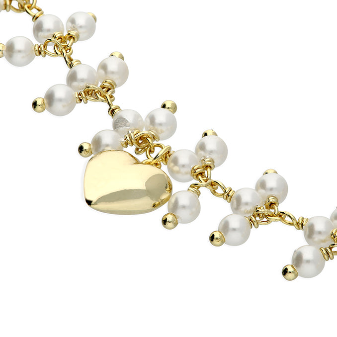 CME Sunshine Faux Pearl and Heart Bracelet with gold-tone chain and decorative heart and pearl accents.